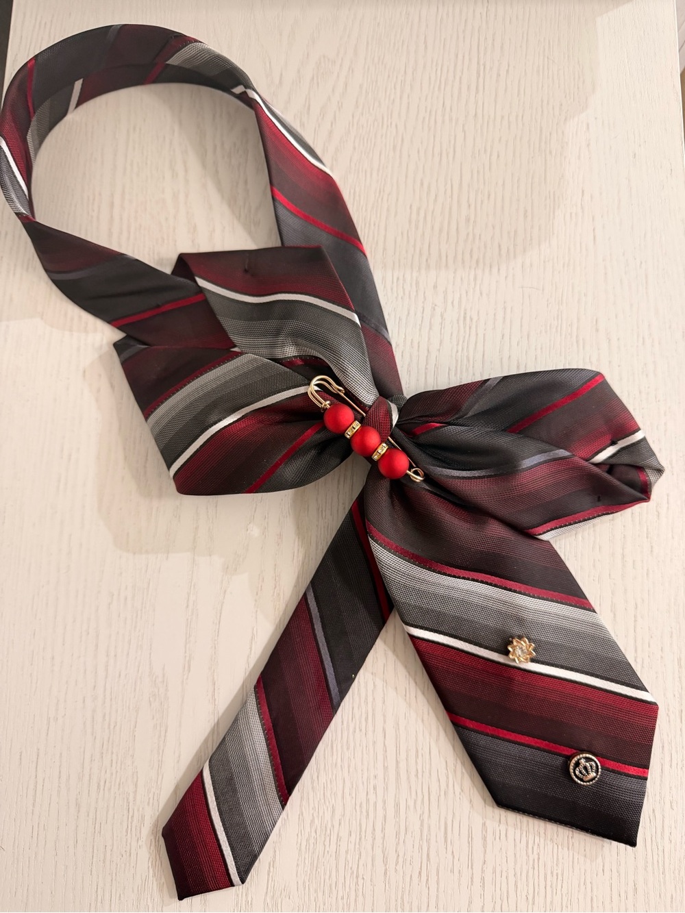 Striped Burgundy and Gray Decorative Tie Necklace with Red Bead Accent